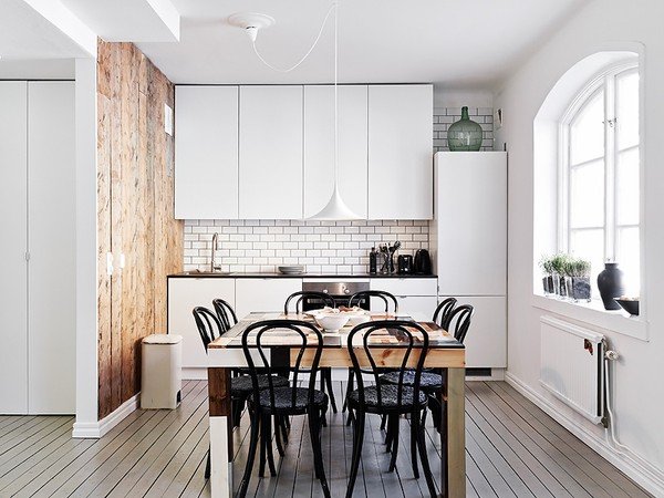 stadshem_wood_wall_gray_floors_white_kitchen_emmas_designblogg_517ee3039606ee31b6afca68