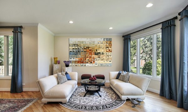 awesome-modern-art-home-lounge-decorating-with-beige-sofas-and-circular-rugs