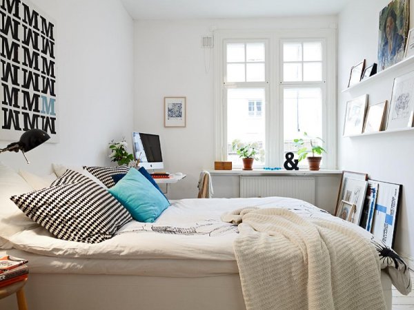 narrow-bedroom-design-scandinavian-style-white-interior-with-sticker-wall-and-computer-desk-near-windows