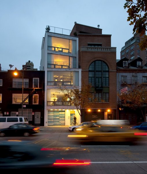 and-heres-what-it-looks-like-today-lit-up-at-night-and-visible-from-the-west-side-highway-by-2009-cortney-and-robert-were-virtually-finished-with-the-home-and-started-shopping-around-for-a-buyer-with-a