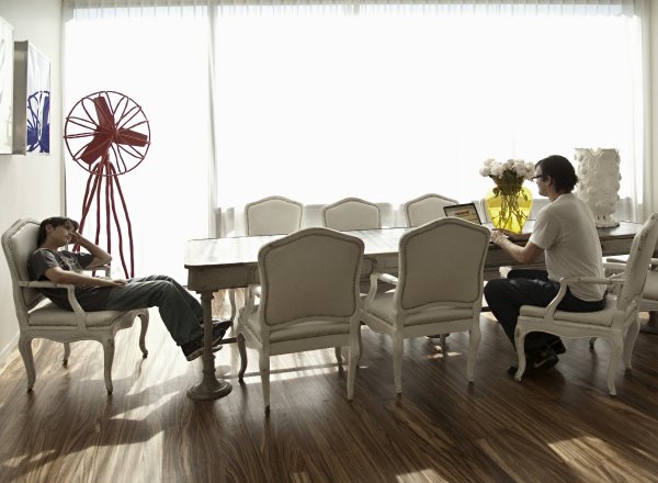 another-space-viewers-will-recognize-is-the-novogratz-kitchen-with-the-large-central-dining-table-and-white-chairs